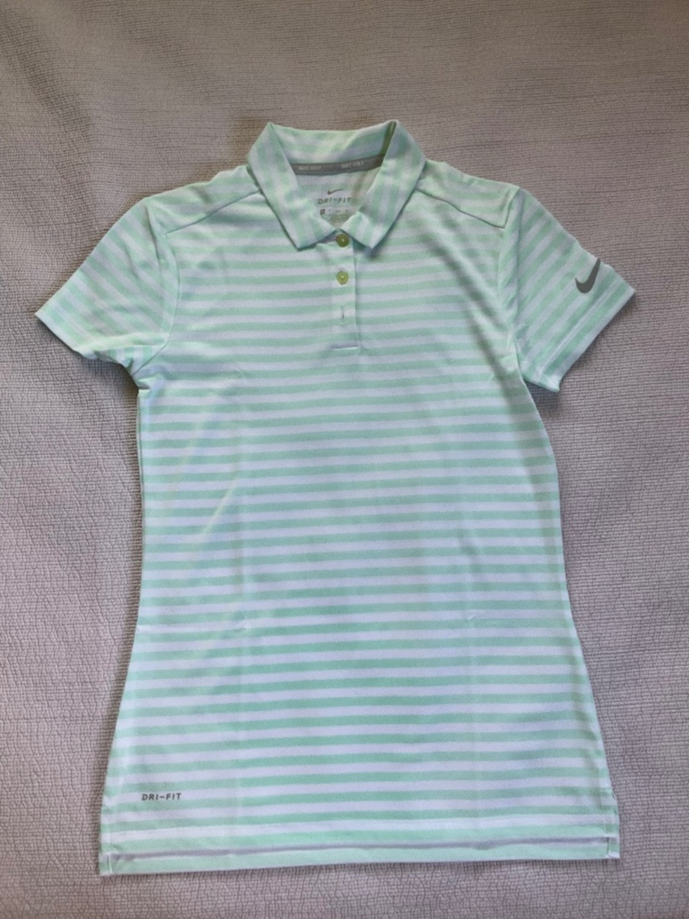 Nike, dri-fit polo shirt in white and mint green stripe in size XS.